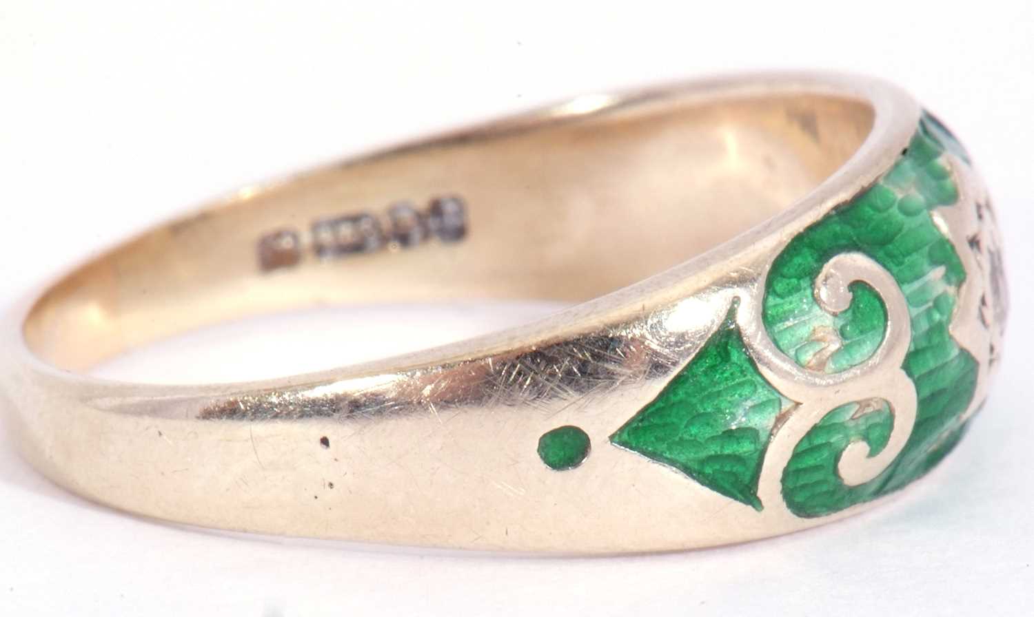 9ct gold green enamel and diamond ring centring a small diamond in a star engraved setting, within a - Image 6 of 7