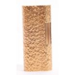 Cased Dunhill lighter of textured design, stamped beneath Dunhill and the letters A/D, 20 and