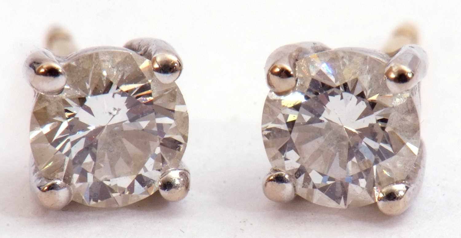 Pair of diamond stud earrings of round brilliant cut, 0.25ct each approx, post fittings, stamped 750 - Image 5 of 7