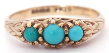 9ct gold turquoise three stone ring featuring three round cabochon turquoises, all in a scroll