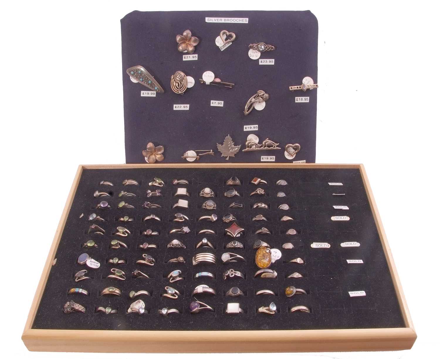 Tray of white metal rings to include some gem set together with a tray of mainly white metal