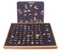 Tray of white metal rings to include some gem set together with a tray of mainly white metal