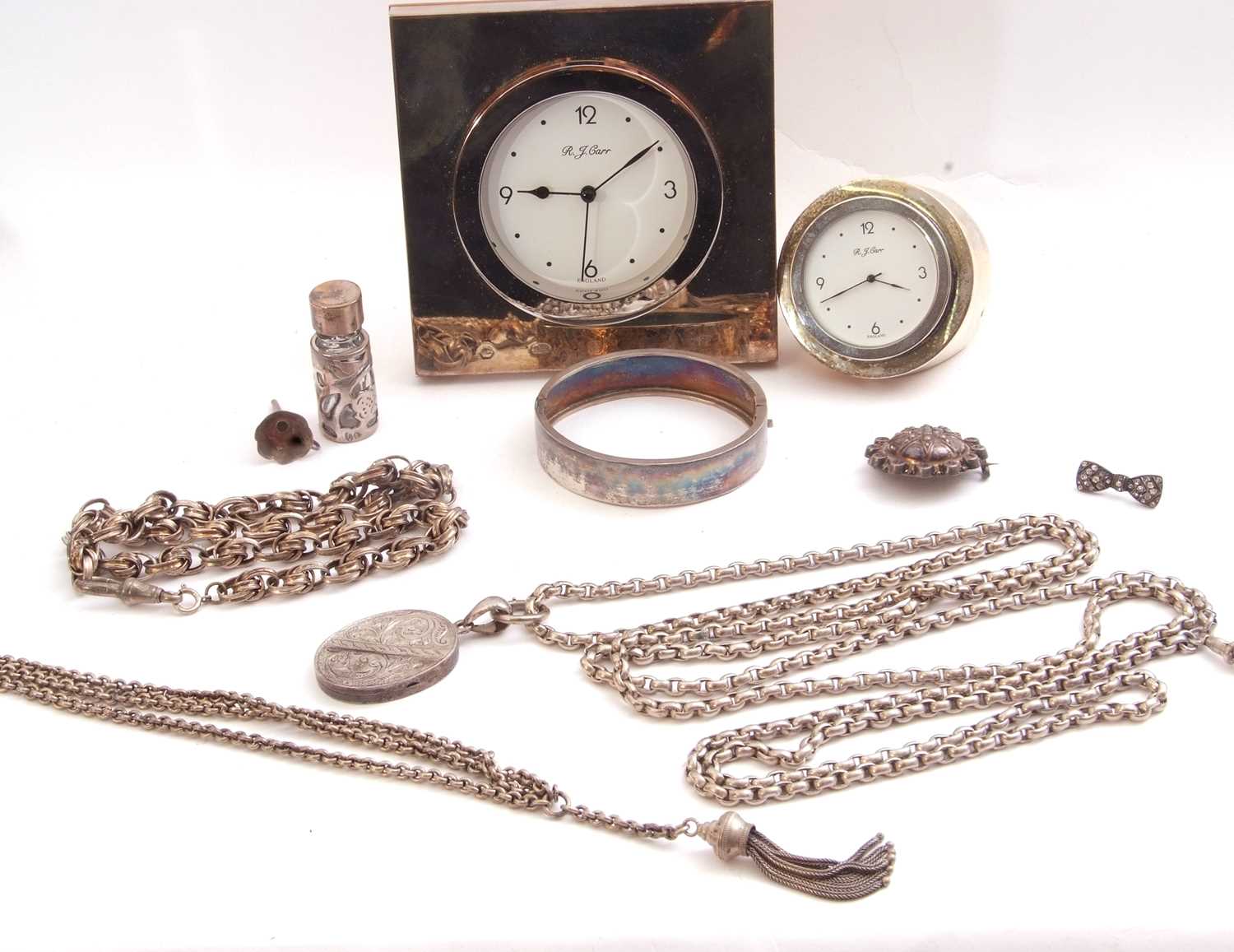 Mixed Lot: modern silver framed travelling clock, import mark, boxed, a small white metal loaded - Image 2 of 2