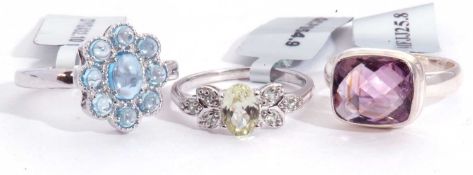 Mixed Lot: Swiss blue topaz cluster ring, a Kerala sillimanite Orissa ring, together with a