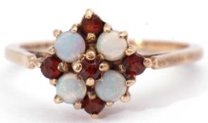 9ct gold opal and garnet cluster ring featuring four small opals and five small garnets in a