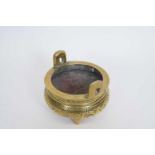 Small Chinese brass censer on three stub feet, 12cm diam