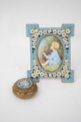 Small photo frame with enamel backing and floral design, together with a further small box