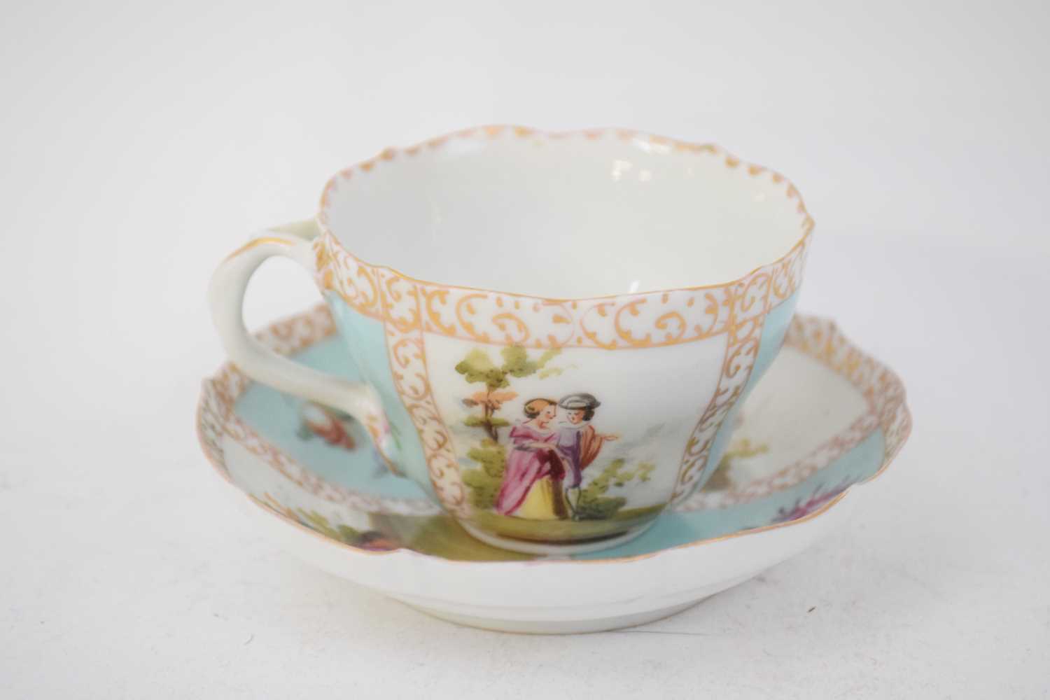 Continental porcelain cup and saucer decorated in Meissen style with panels of figures - Image 5 of 8