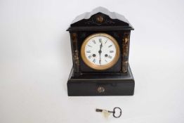 Late 19th century black slate mantel clock, the dial flanked by two columns, complete with key, 26cm