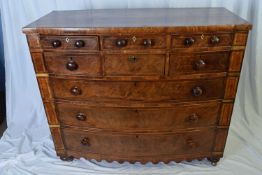 Victorian mahogany bow front chest with six small drawers and three long drawers, turned knob