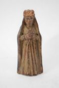 Small wooden carved figure of a saint, or possibly part of an altar piece or reredos, probably