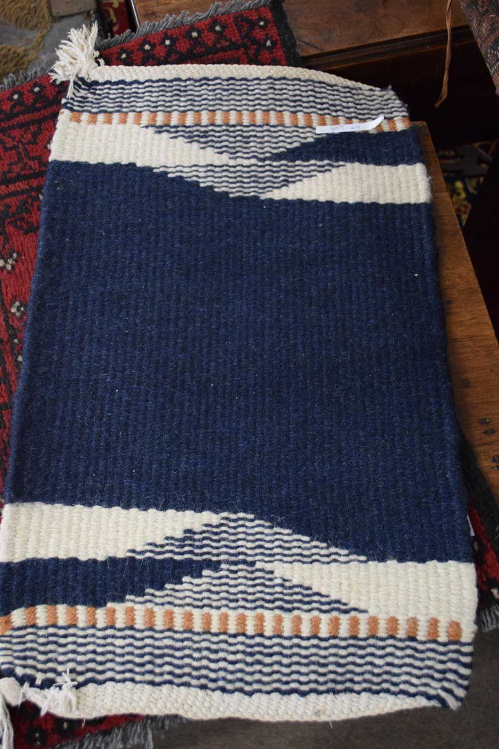 Small Bokhara type wool prayer mat decorated with two lozenges on a red background, together with