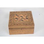 19th century Tunbridge ware box of hinged square form, the lid decorated with geometric design of