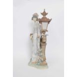 Large Lladro figure of a Japanese lady with fan standing against a lantern on shaped base, 40cm