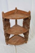 Indian hardwood corner whatnot with carved side supports, 82cm high