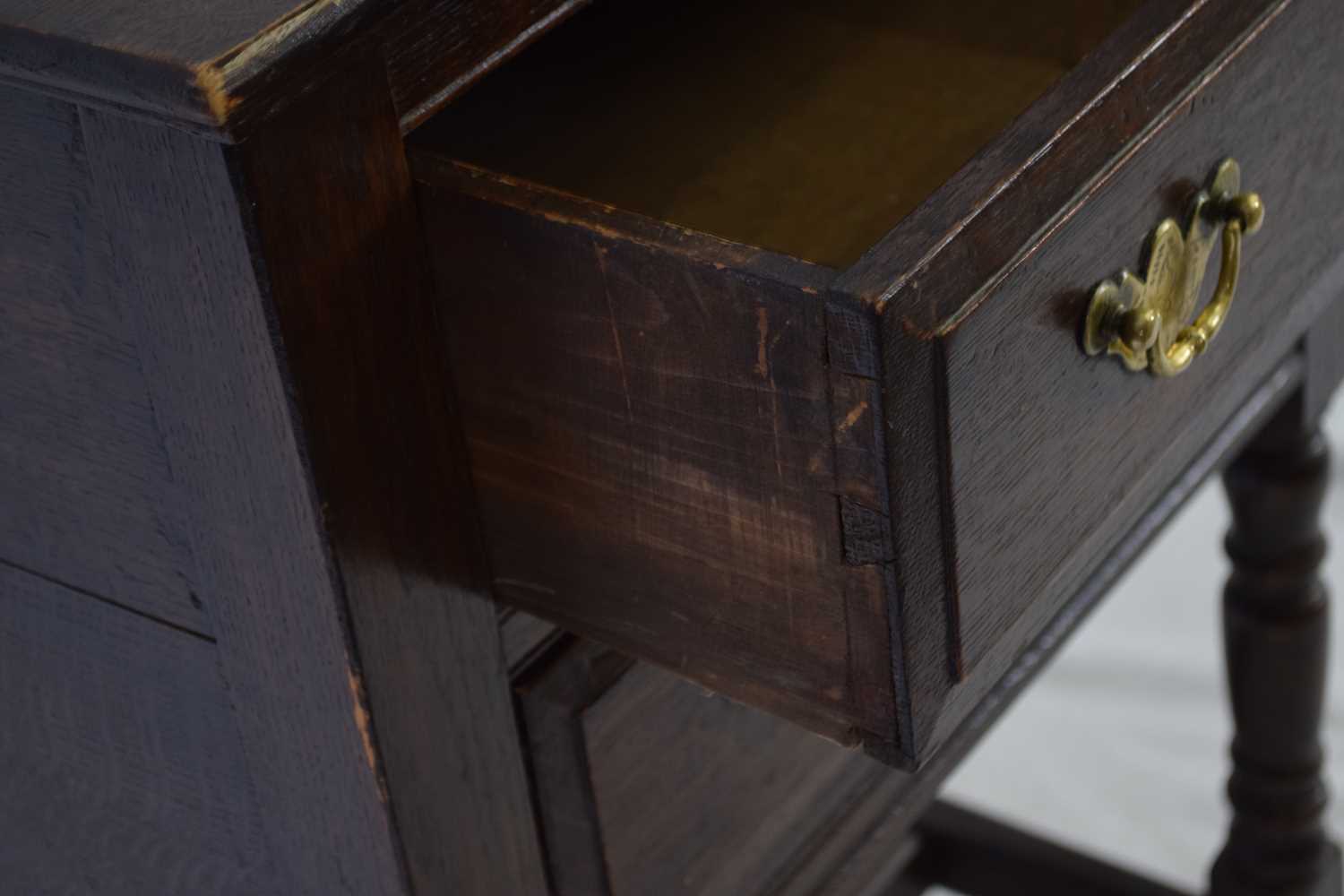 18th century style oak two-drawer side cabinet raised on turned legs, 56cm wide - Image 4 of 4