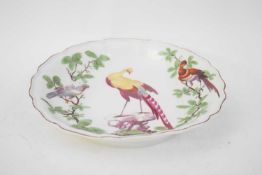Chelsea porcelain shaped dish, the centre decorated with an exotic bird on rockwork surrounded by
