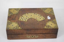 19th century brass bound and figured hardwood games box of hinged rectangular form, the interior