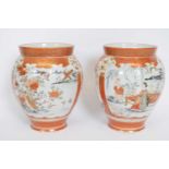 Pair of Japanese Meiji period Satsuma vases decorated in typical fashion, 21cm high (2)