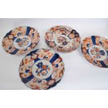 Four Japanese porcelain Imari style dishes with scalloped rims, 30cm diam (4)