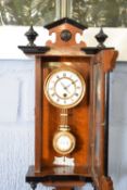 Unusual late 19th century miniature Vienna wall clock with mahogany and ebonised case, enamelled