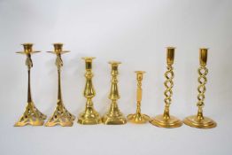 Collection of brass candlesticks, one pair in Art Nouveau style
