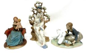 Lladro figure of a Japanese lady seated against a tree, 31cm high, together with a figure of a young