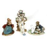 Lladro figure of a Japanese lady seated against a tree, 31cm high, together with a figure of a young