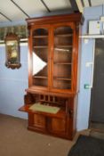 Victorian mahogany secretaire bookcase cabinet, moulded cornice over two glazed doors opening to a