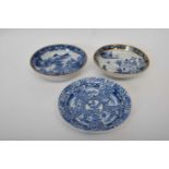 Group of three 18th century Qianlong period saucers with blue and white designs (3)