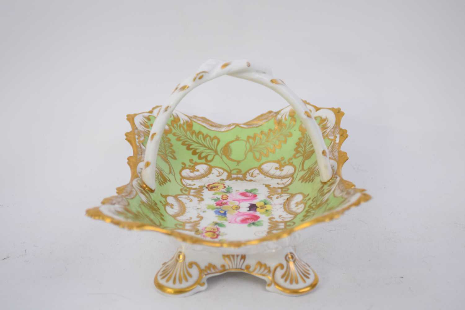 Late 19th century English porcelain basket, the green ground with floral design to the - Image 3 of 5