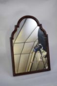 Early 20th century mahogany framed dressing table mirror of arched form fitted with an easel back,