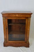 Victorian walnut and inlaid pier cabinet decorated with applied metal detail and fitted with a