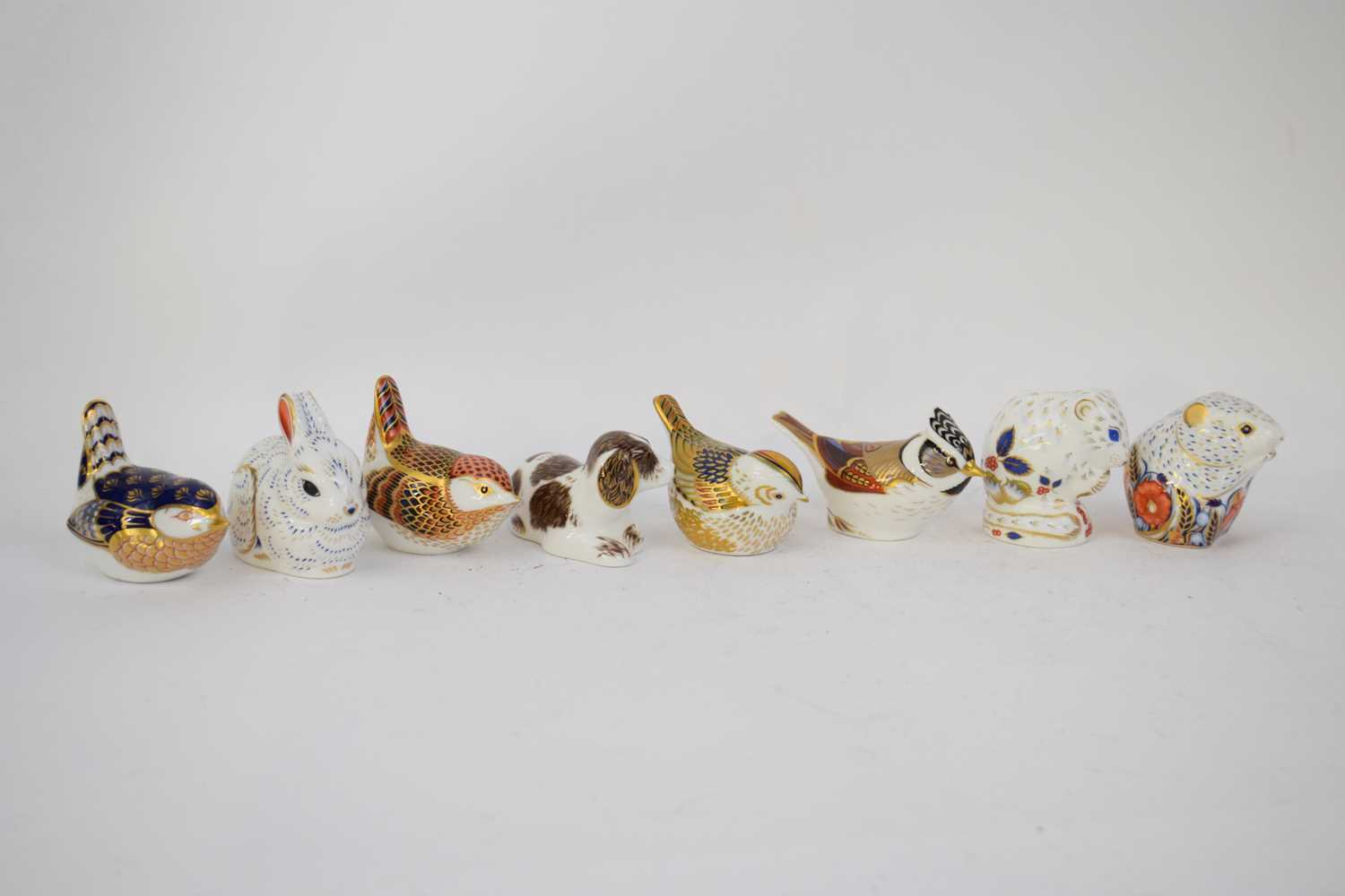 Group of Royal Crown Derby paperweights including models of a mouse, various birds and a rabbit (8)