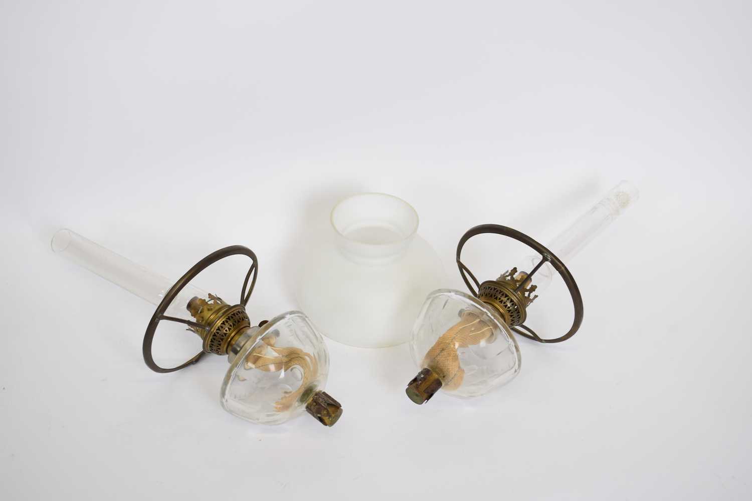 Pair of glass reservoirs and one white opaque shade