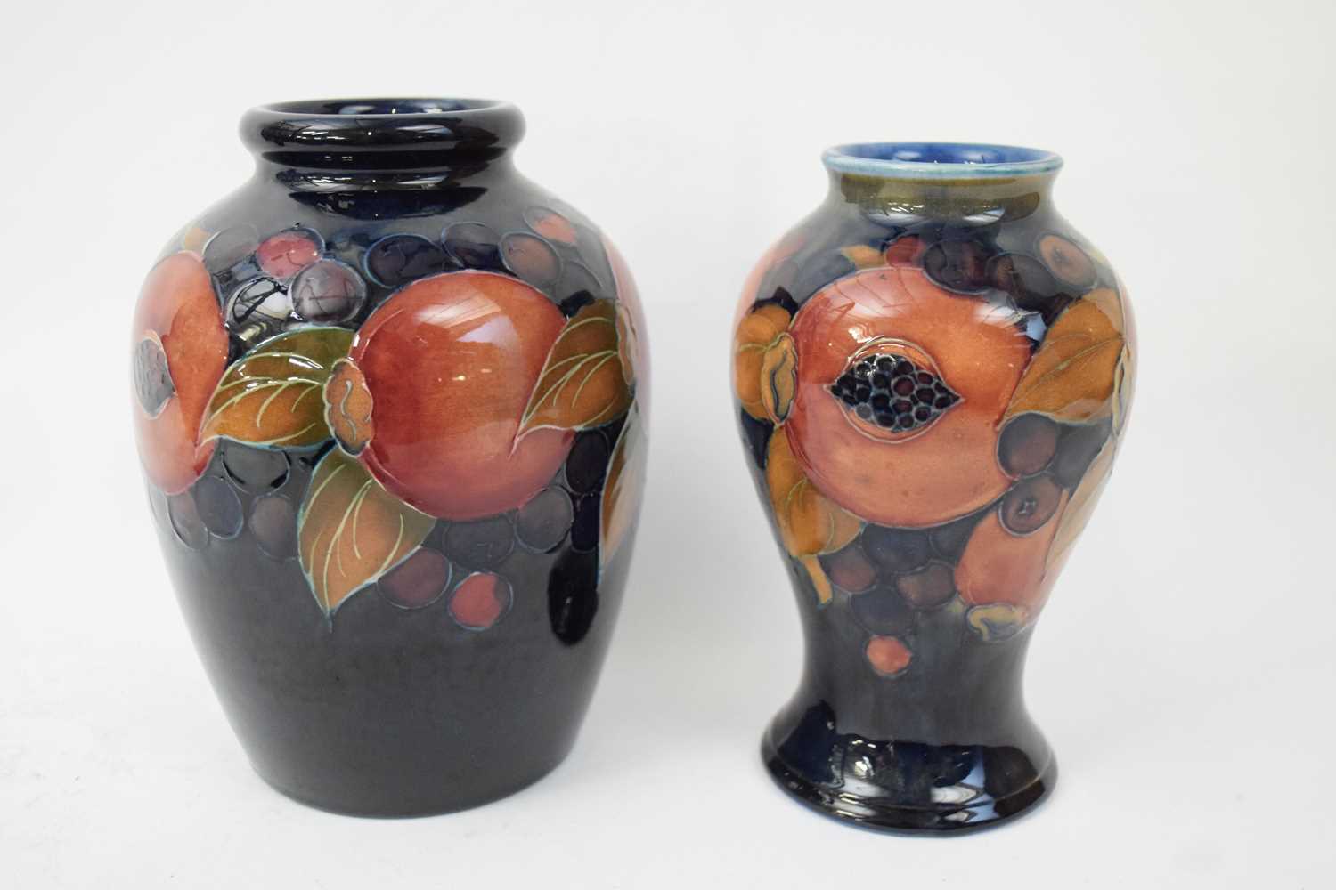 Moorcroft baluster vase in pomegranate pattern together with a further vase (a/f) (2) - Image 2 of 4