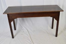 18th century oak side or serving table of plain rectangular form raised on square legs