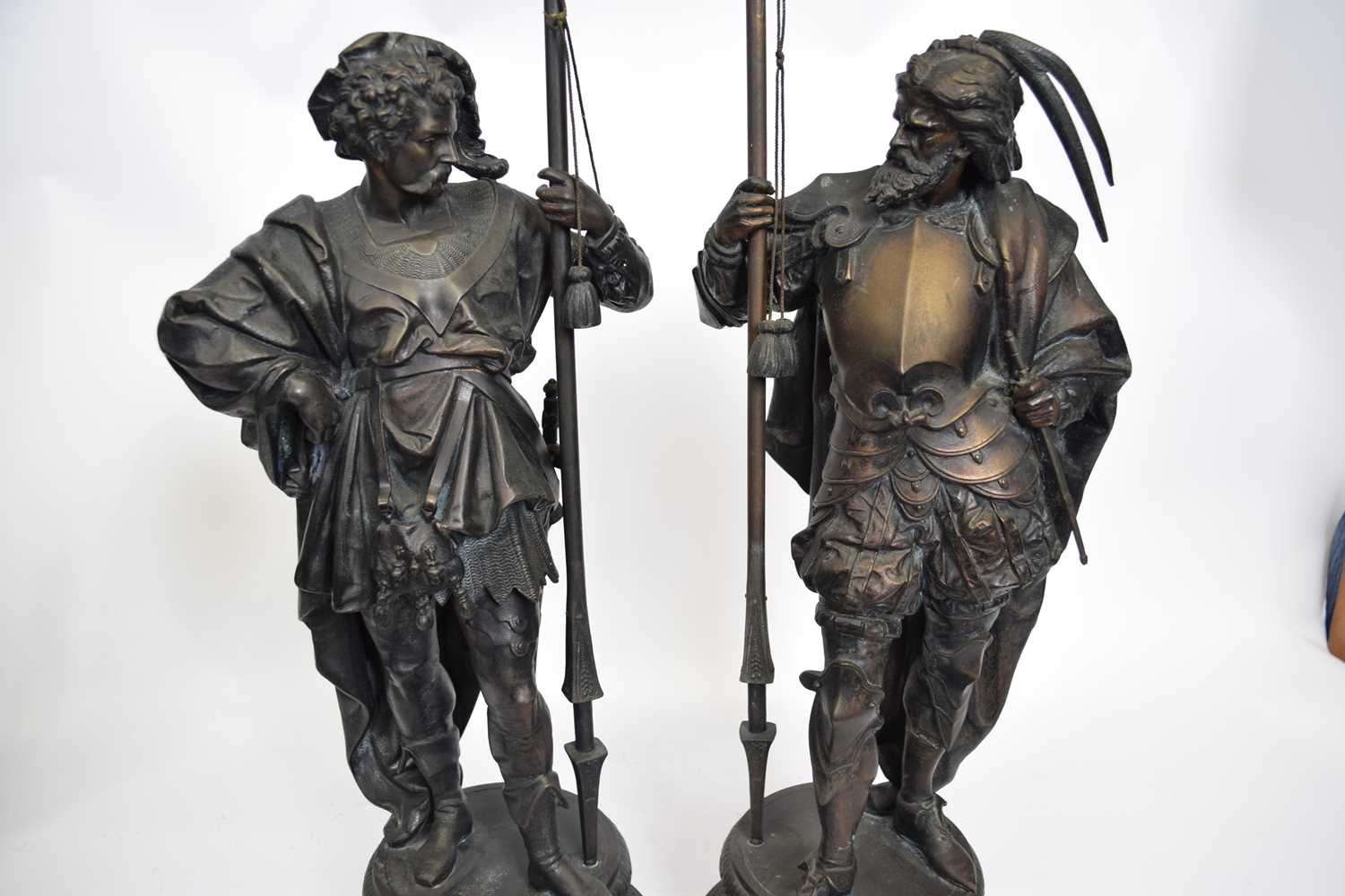 Pair of 19th century bronzed spelter models of lance wielding soldiers, raised on circular plinth - Image 3 of 3