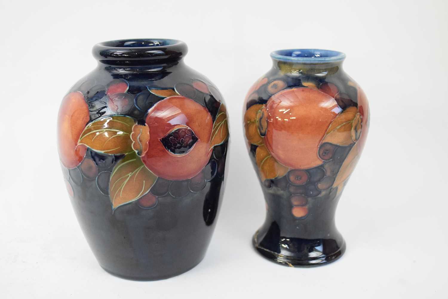 Moorcroft baluster vase in pomegranate pattern together with a further vase (a/f) (2) - Image 4 of 4