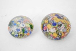 Two glass paperweights with scrambled design with canes and latticino style strips (2)