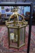 Hexagonal brass and glass mounted lantern light fitting with three internal electric lights, 48cm