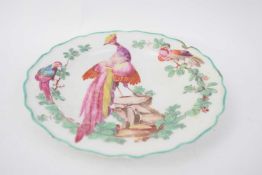 Chelsea porcelain plate decorated with an exotic bird on rock work surround by further birds to