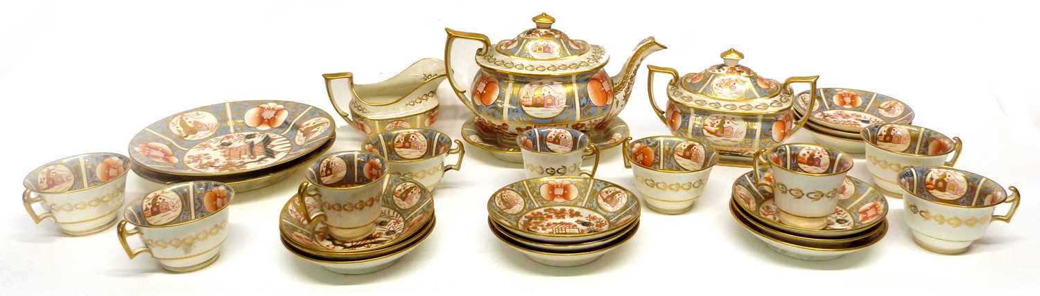 Early 19th century English porcelain tea set in an Imari design comprising tea pot and stand, milk - Image 2 of 4