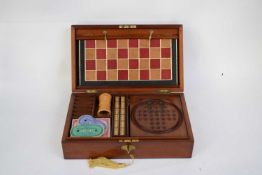 Wooden box containing games compendium, dice, chequerboard, counters etc