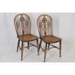 Pair of late 19th/early 20th century hoop and spindle back elm seated kitchen chairs