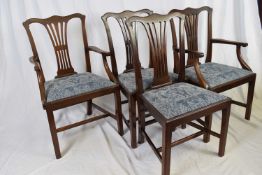Set of 12 late Georgian style mahogany dining chairs with pierced splat backs, blue upholstered