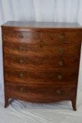 Early Victorian mahogany bow front chest of two short over three long drawers fitted with ringlet
