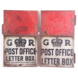 Two early 20th century Post Office metal doors on wooden backing, both with GR cipher and