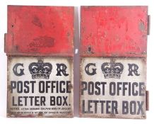 Two early 20th century Post Office metal doors on wooden backing, both with GR cipher and