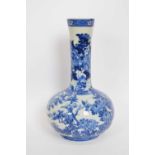 Japanese porcelain vase with blue and white floral design, 32cm high